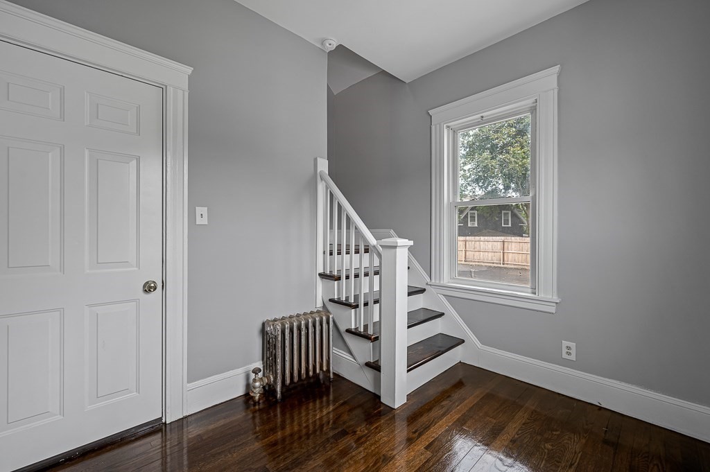 50 Ruggles Street, Unit 3 Franklin, MA 02038 - Photo 3 of 17 a view of entryway with wooden floor and stairs