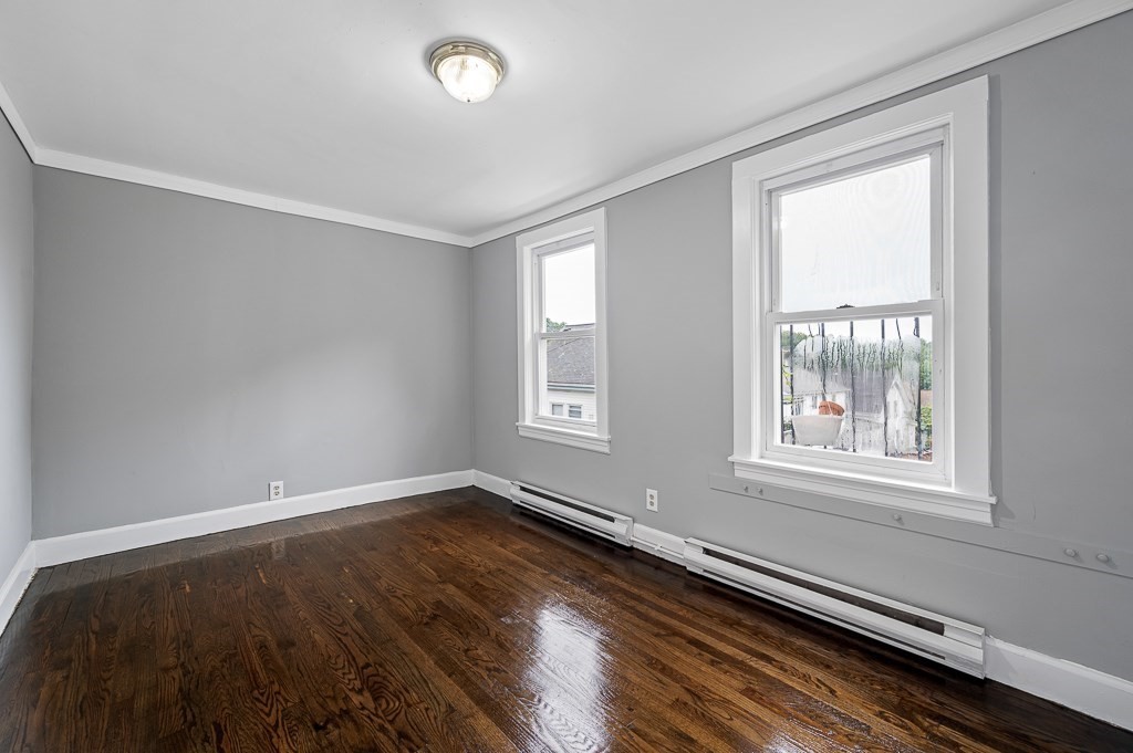 50 Ruggles Street, Unit 3 Franklin, MA 02038 - Photo 9 of 17 a view of an empty room with a window