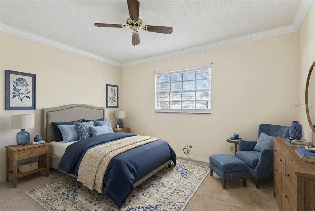 141 Northeast 50th Court Ocala, FL 34470 - Photo 15 of 42 a bedroom with a bed and window