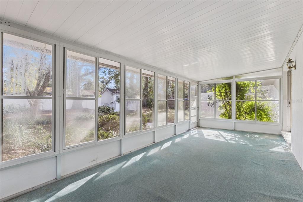 141 Northeast 50th Court Ocala, FL 34470 - Photo 29 of 42 a view of empty room with floor to ceiling window