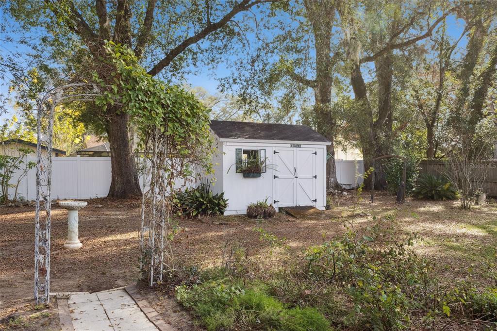 141 Northeast 50th Court Ocala, FL 34470 - Photo 32 of 42 a view of a house with a yard
