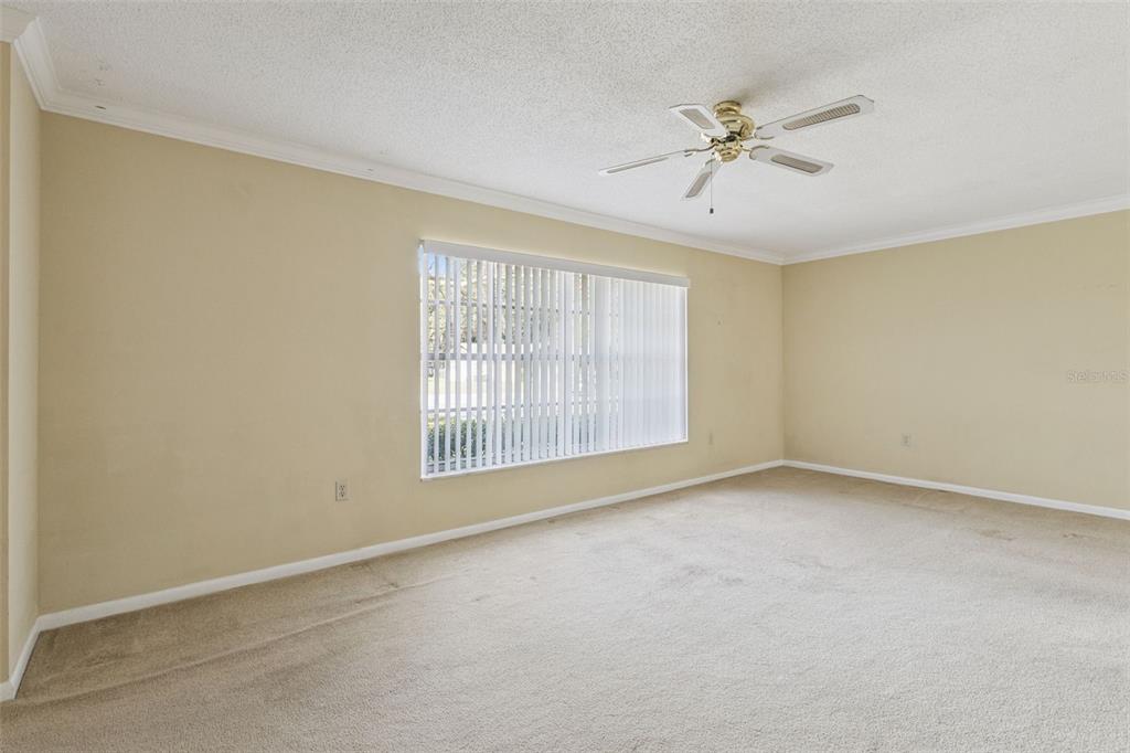 141 Northeast 50th Court Ocala, FL 34470 - Photo 7 of 42 a view of an empty room with a window