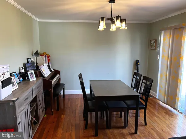 a kitchen with wooden cabinets and a stove top oven