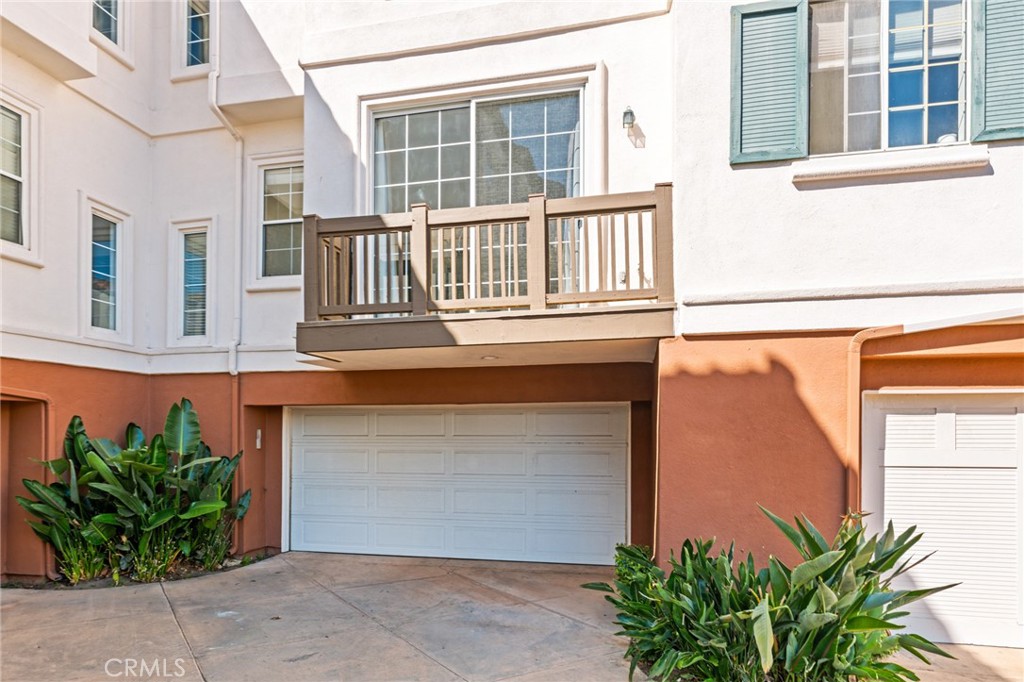2821 Player Lane Tustin, CA 92782 - Photo 18 of 18 a front view of a house with plants