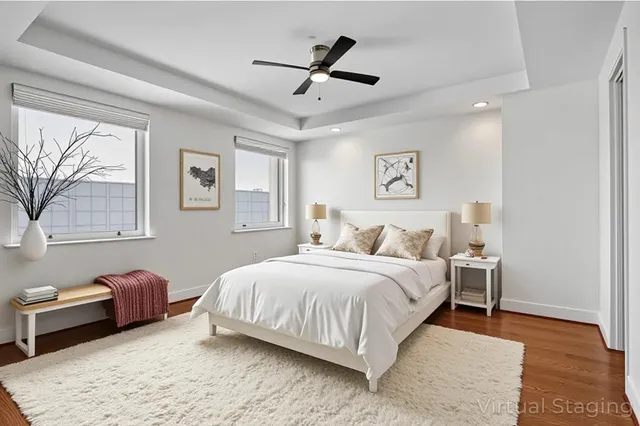 a bedroom with a bed and a couch