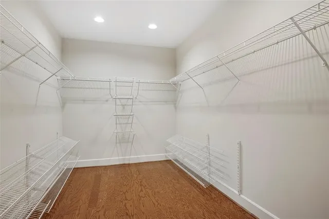 a view of a room with racks on the wall