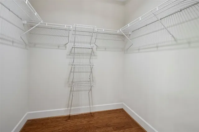 a view of a room with racks on the wall