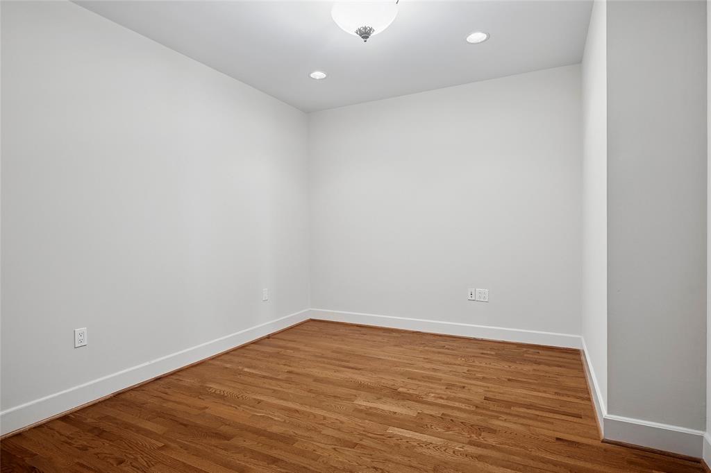 1505 Elm Street, Unit 603 Dallas, TX 75201 - Photo 19 of 36 wooden floor in a room