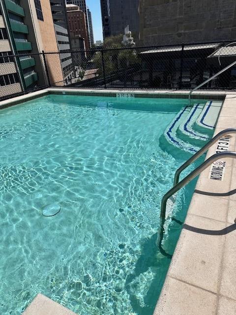 1505 Elm Street, Unit 603 Dallas, TX 75201 - Photo 24 of 36 a view of yard with swimming pool