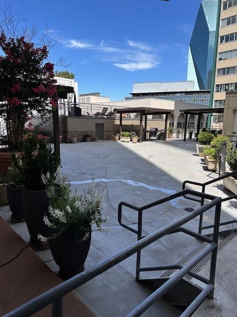 1505 Elm Street, Unit 603 Dallas, TX 75201 - Photo 29 of 36 a view of a swimming pool with seating space