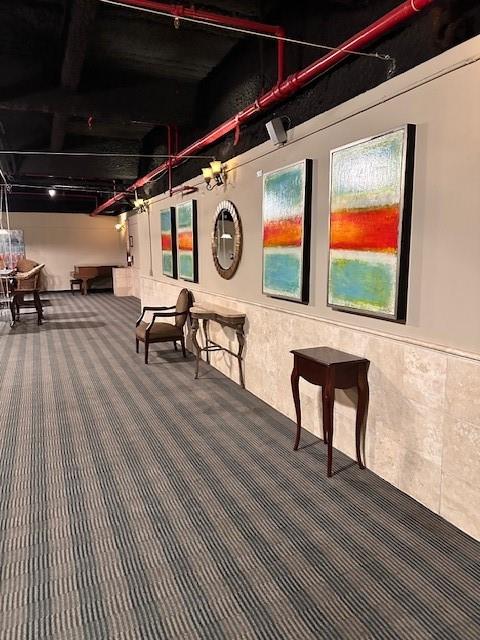 1505 Elm Street, Unit 603 Dallas, TX 75201 - Photo 33 of 36 a view of a chairs and table on the roof deck