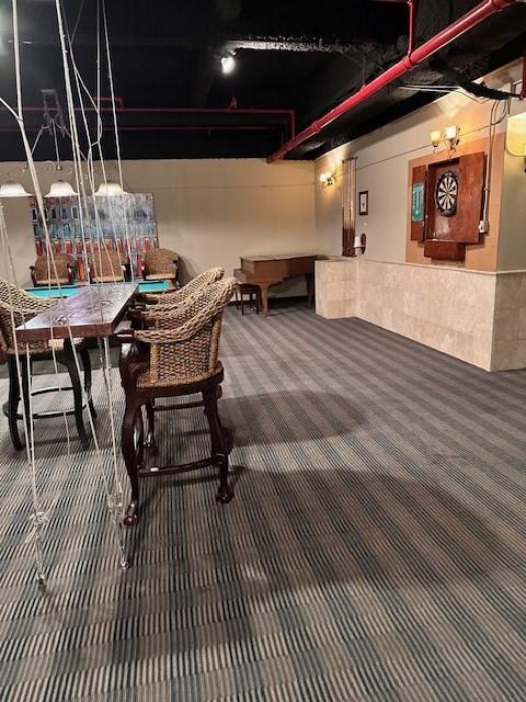 1505 Elm Street, Unit 603 Dallas, TX 75201 - Photo 36 of 36 a view of a chairs and table in the patio