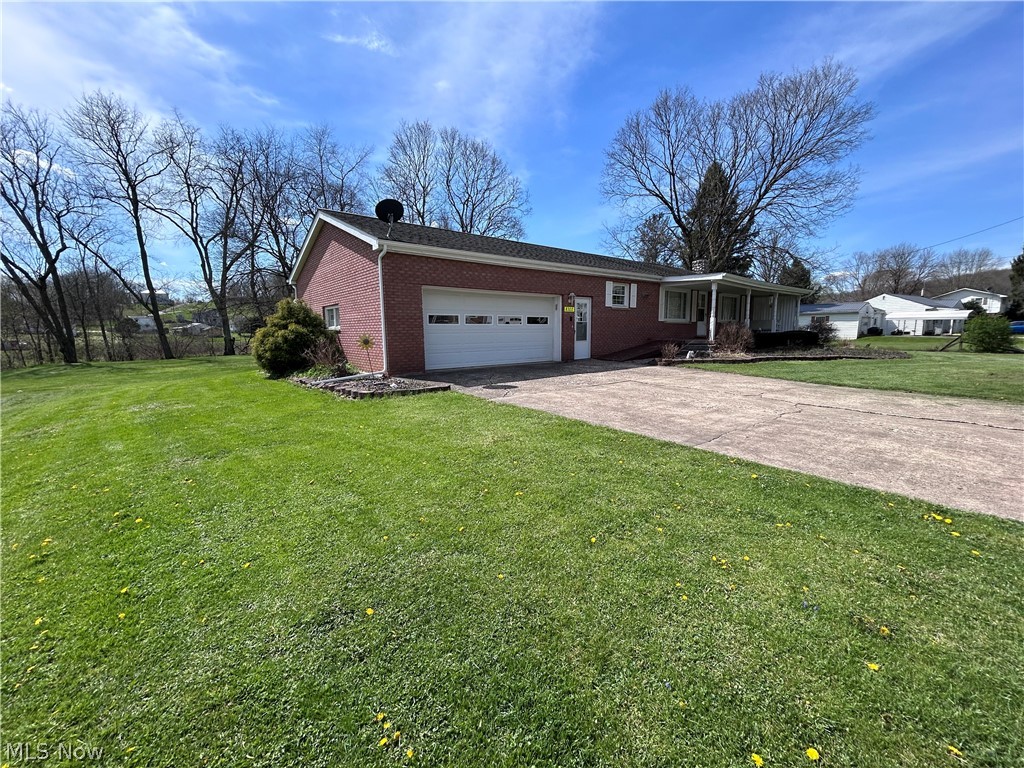 8300 Bear Road Southeast Amsterdam, OH 43903 - Photo 3 of 38 2 Car Attached Garage