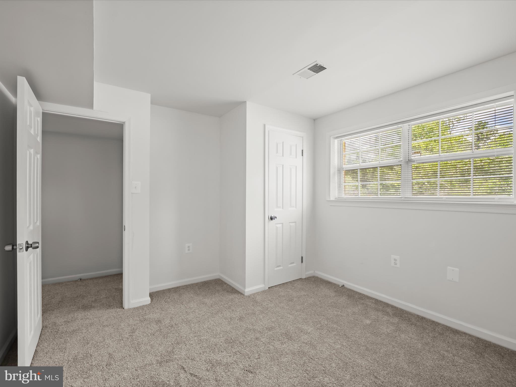13303 Pendleton Street Fort Washington, MD 20744 - Photo 23 of 35 a view of an empty room with a window