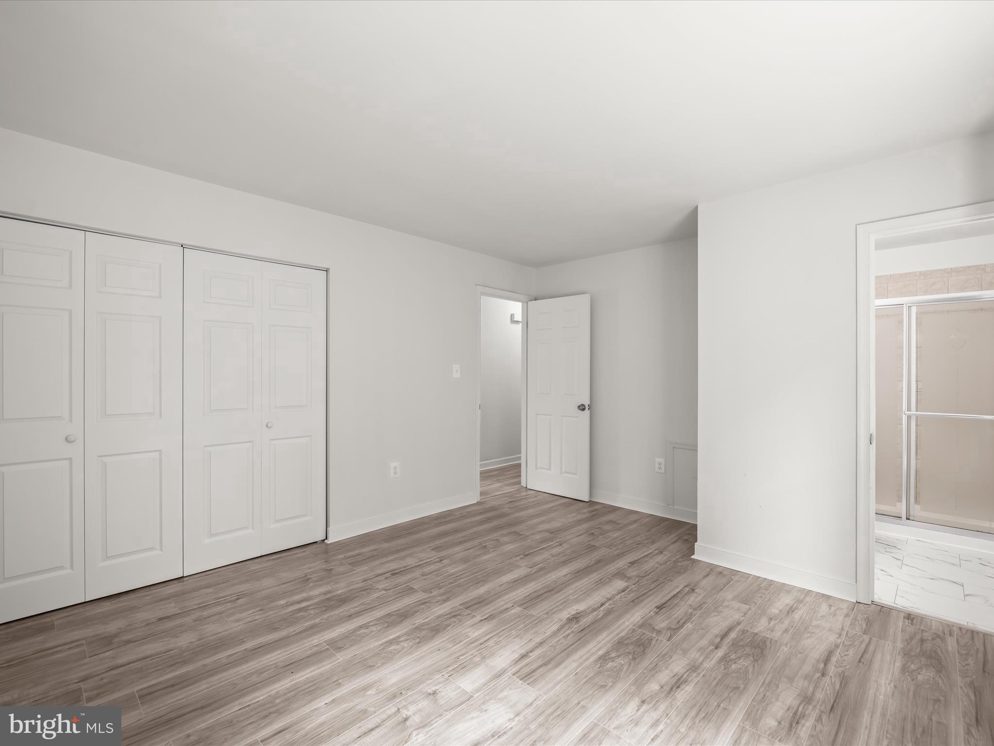13303 Pendleton Street Fort Washington, MD 20744 - Photo 27 of 35 a view of an empty room with wooden floor
