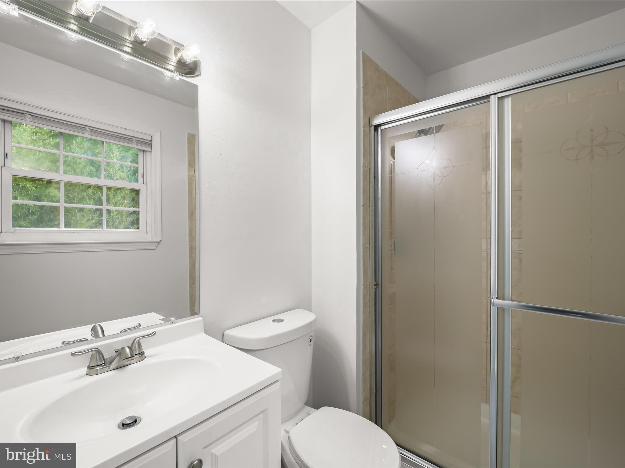 13303 Pendleton Street Fort Washington, MD 20744 - Photo 28 of 35 a bathroom with a sink toilet and shower