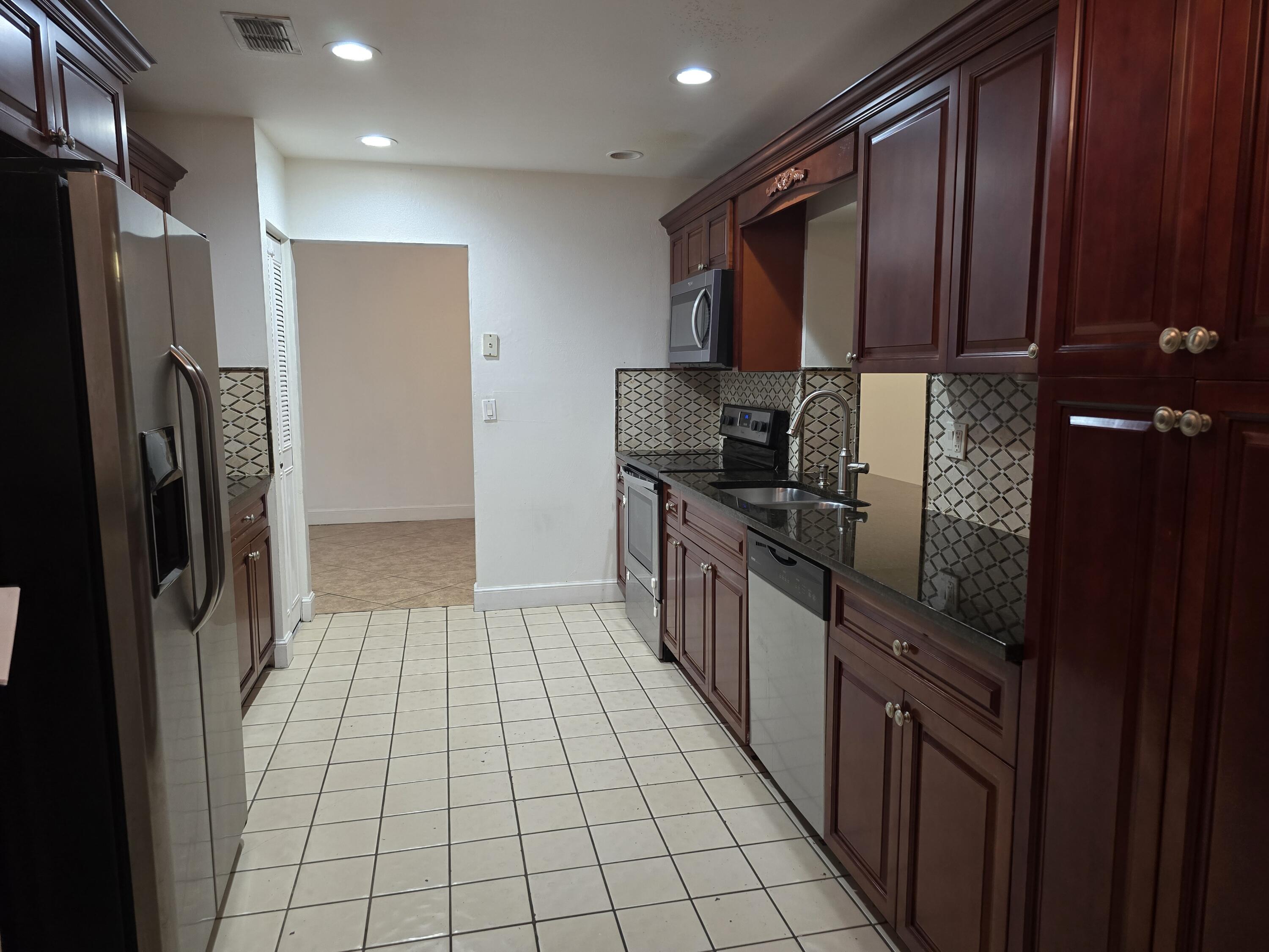 4125 Pine Branch Circle Lake Worth, FL 33467 - Photo 4 of 39 20250901_111407