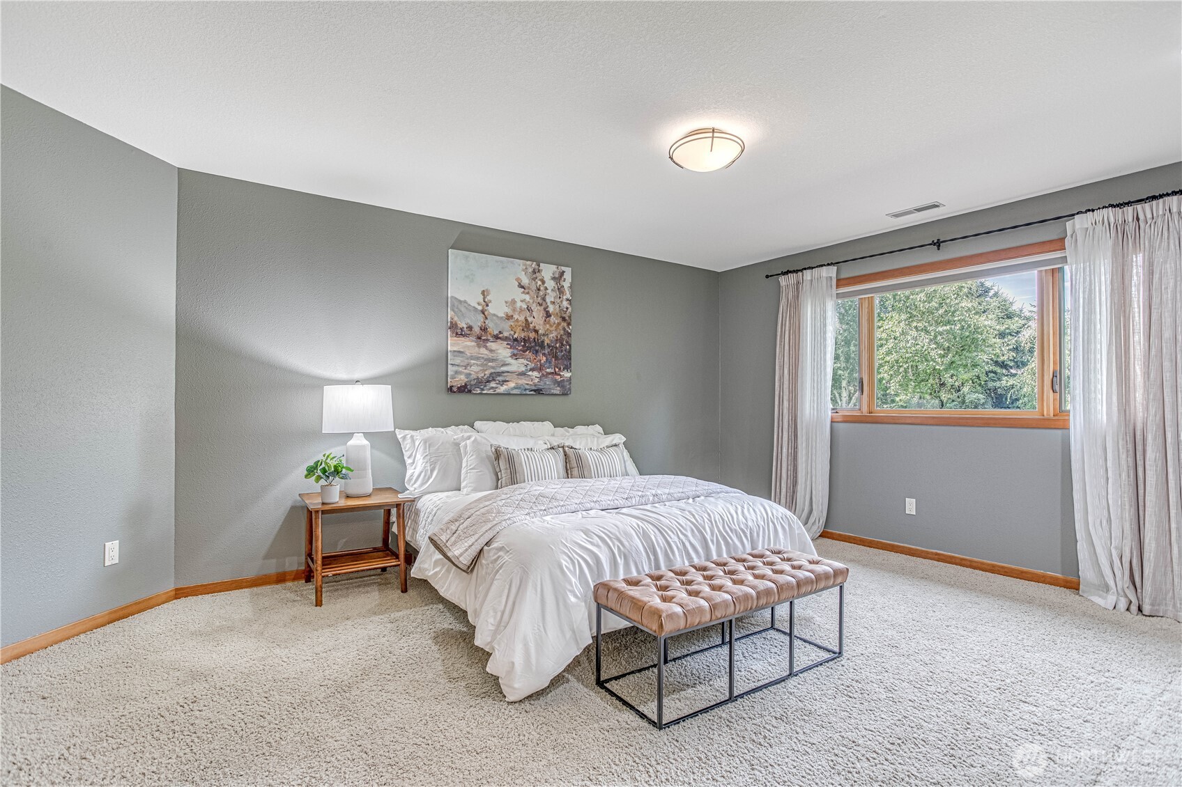 423 Lombard Lane Wenatchee, WA 98801 - Photo 18 of 36 a bedroom with a bed and a window