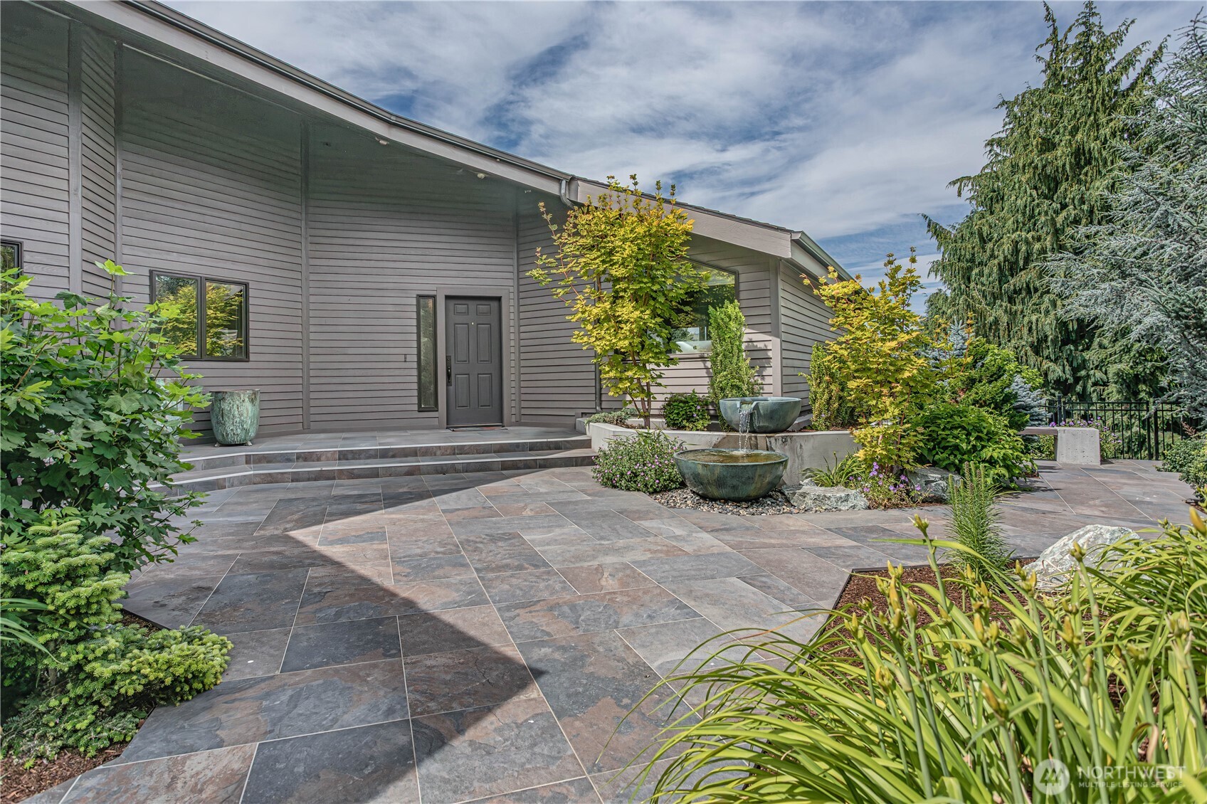 423 Lombard Lane Wenatchee, WA 98801 - Photo 29 of 36 a view of a house with potted plants