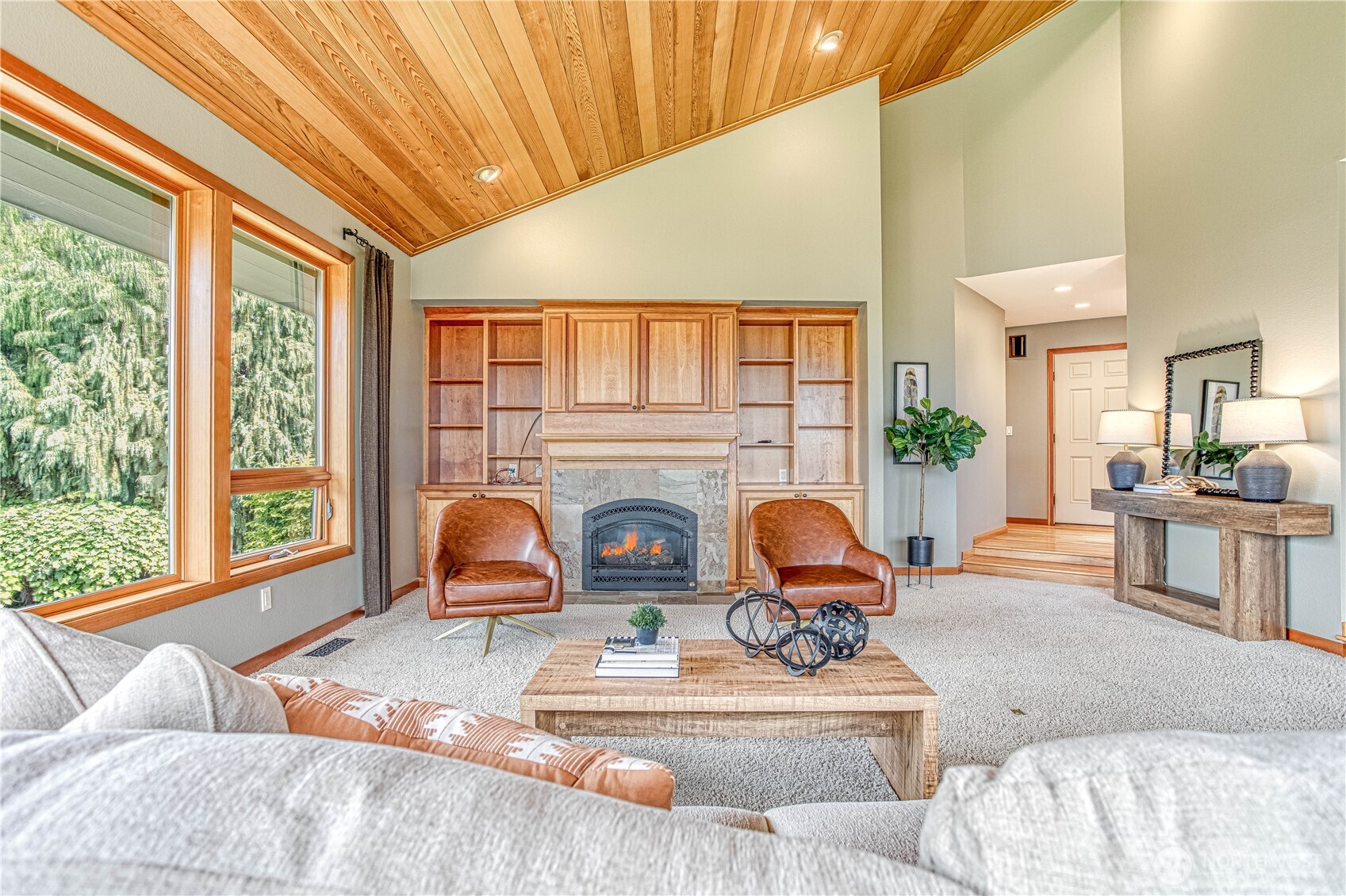 423 Lombard Lane Wenatchee, WA 98801 - Photo 6 of 36 a living room with furniture a fireplace and large window