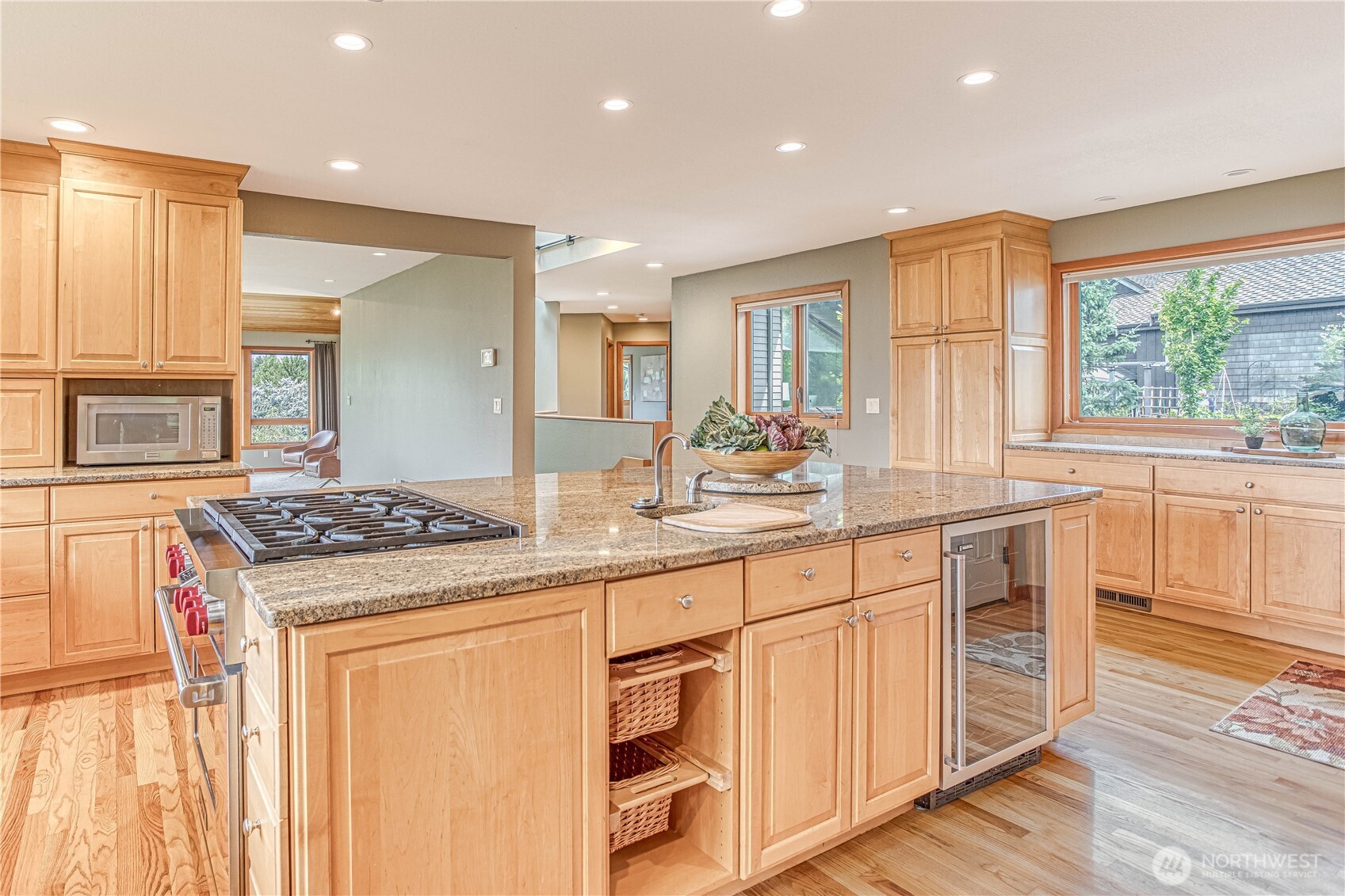 423 Lombard Lane Wenatchee, WA 98801 - Photo 10 of 36 a kitchen with stainless steel appliances granite countertop a stove a sink and a refrigerator