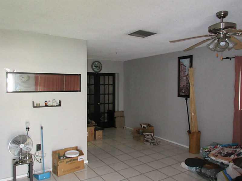 8516 Northwest 57th Court Tamarac, FL 33321 - Photo 2 of 6 Living Room