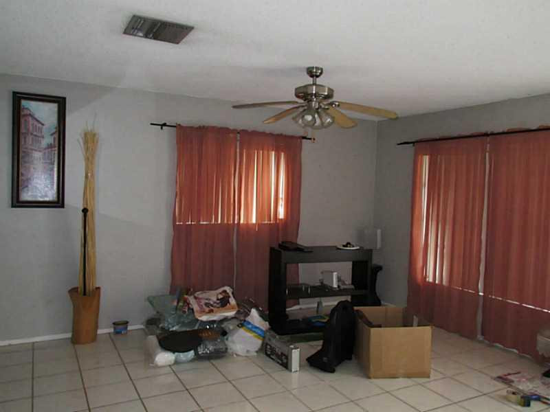 8516 Northwest 57th Court Tamarac, FL 33321 - Photo 3 of 6 Living Room