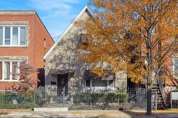 a view of a building and a tree