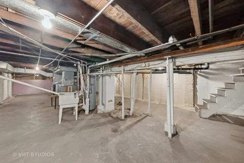 a view of an empty room with wooden roof