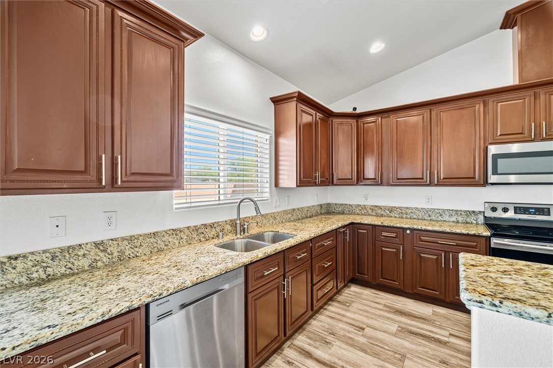 6720 Stubblefield Drive Pahrump, NV 89061 - Photo 13 of 51 Culinary creations come alive in this kitchen featuring abundant cabinetry and gleaming stone countertops.