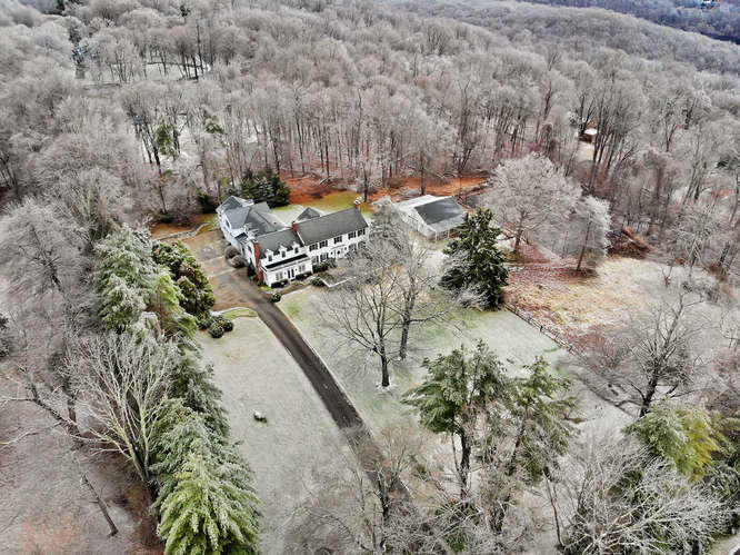 64 Cross Ridge Road New Canaan, CT 06840 - Photo 1 of 2 a view of a forest with trees