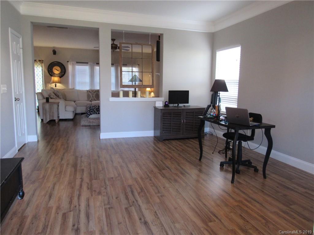 4406 Red Hook Road Monroe, NC 28110 - Photo 2 of 15 a living room with furniture and a wooden floor