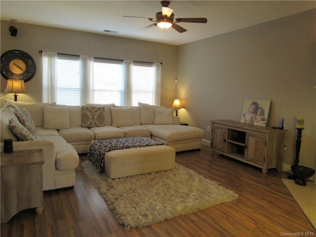 4406 Red Hook Road Monroe, NC 28110 - Photo 4 of 15 a living room with furniture and a fireplace