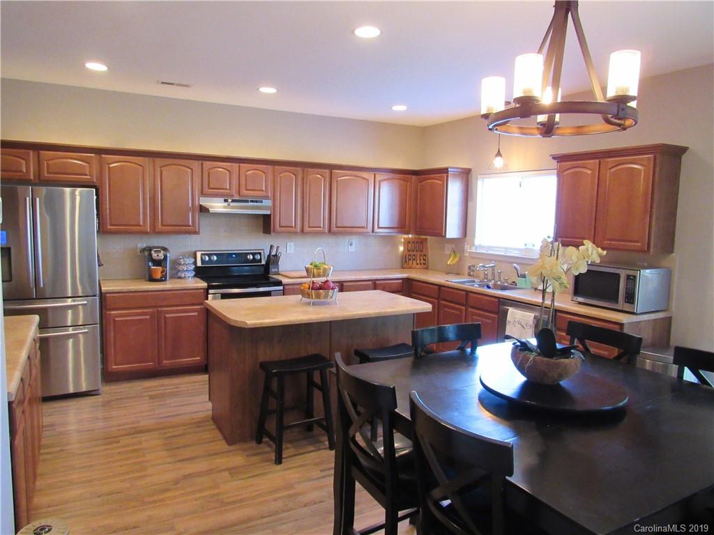 4406 Red Hook Road Monroe, NC 28110 - Photo 5 of 15 a kitchen with a sink appliances and cabinets