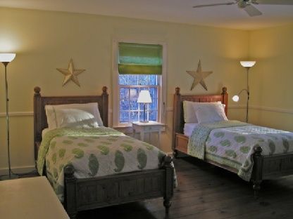 372 Brick Kiln Road Bridgehampton, NY 11963 - Photo 13 of 15 a bedroom with a bed and a night stand