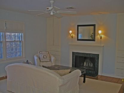372 Brick Kiln Road Bridgehampton, NY 11963 - Photo 14 of 15 a bedroom with a bed and a fireplace