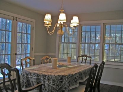 372 Brick Kiln Road Bridgehampton, NY 11963 - Photo 3 of 15 a dining room with furniture and chandelier