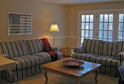 372 Brick Kiln Road Bridgehampton, NY 11963 - Photo 5 of 15 a living room with furniture and a lamp
