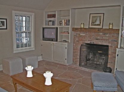 372 Brick Kiln Road Bridgehampton, NY 11963 - Photo 9 of 15 a living room with furniture and a fireplace