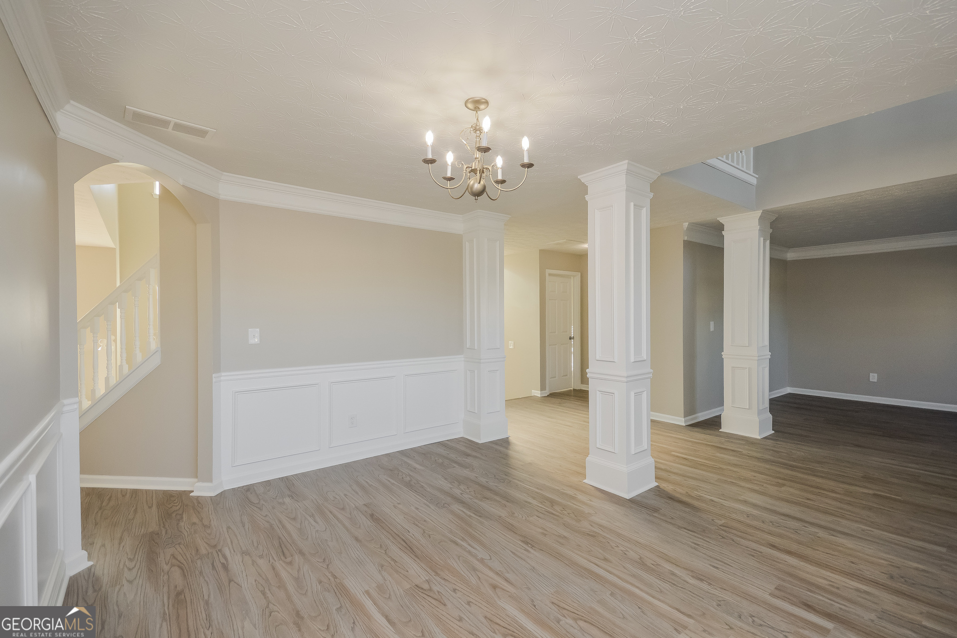 90 Emerson Trail Covington, GA 30016 - Photo 6 of 17 wooden floor in an empty room with a window