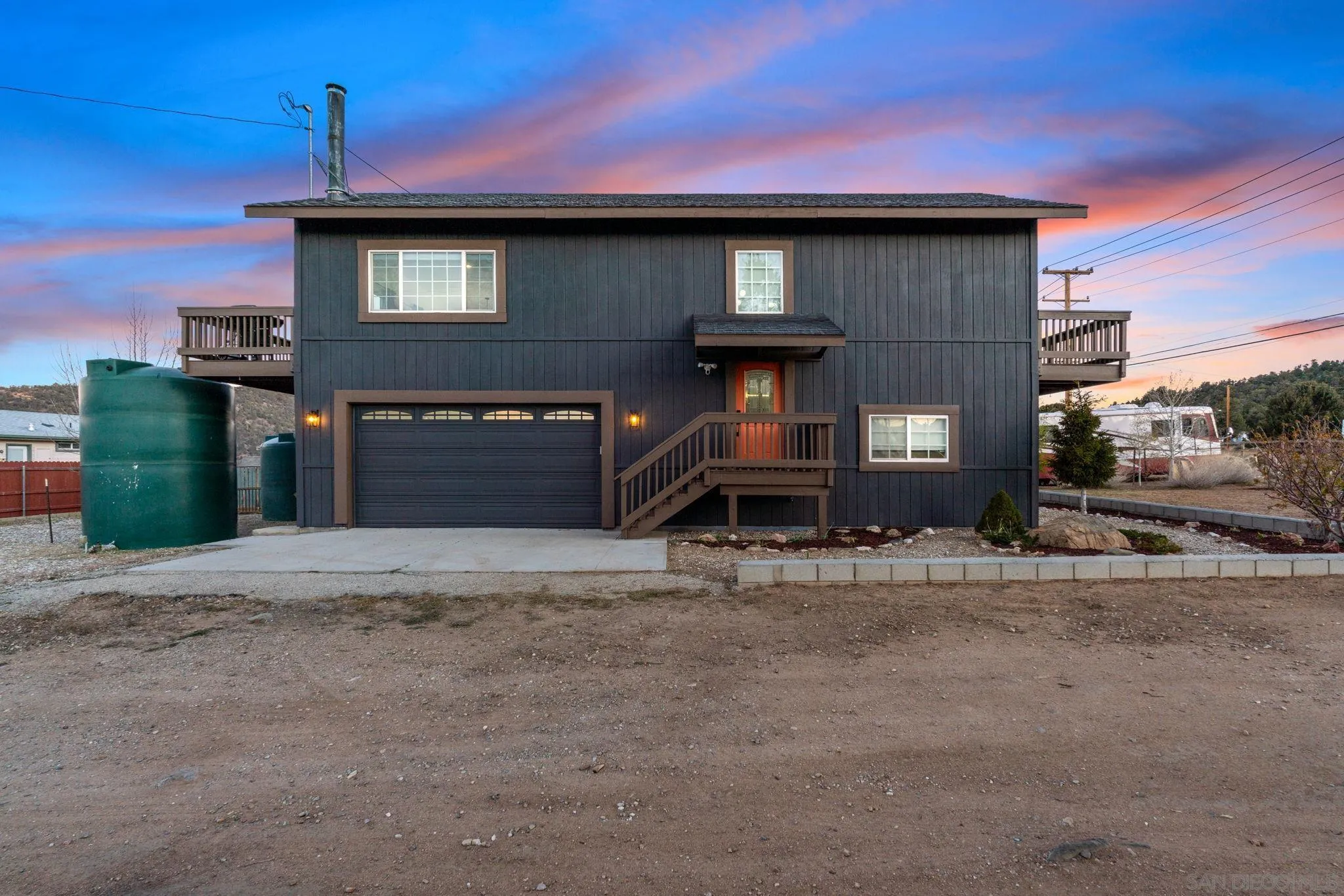 1842 Baldwin Lake Road Big Bear City, CA 92314 - Photo 1 of 40 a front view of a house with a yard