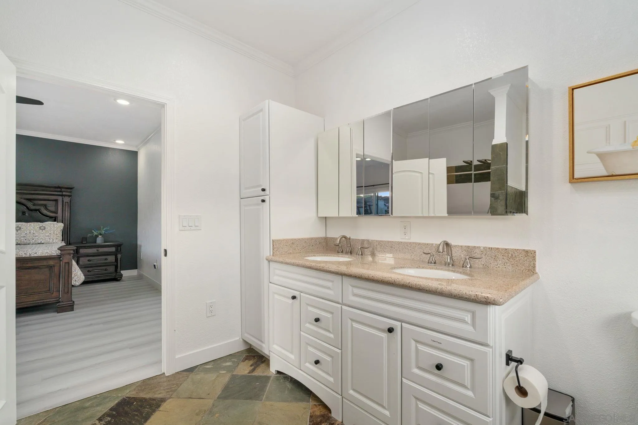 1842 Baldwin Lake Road Big Bear City, CA 92314 - Photo 28 of 40 a spacious bathroom with a granite countertop sink and a mirror