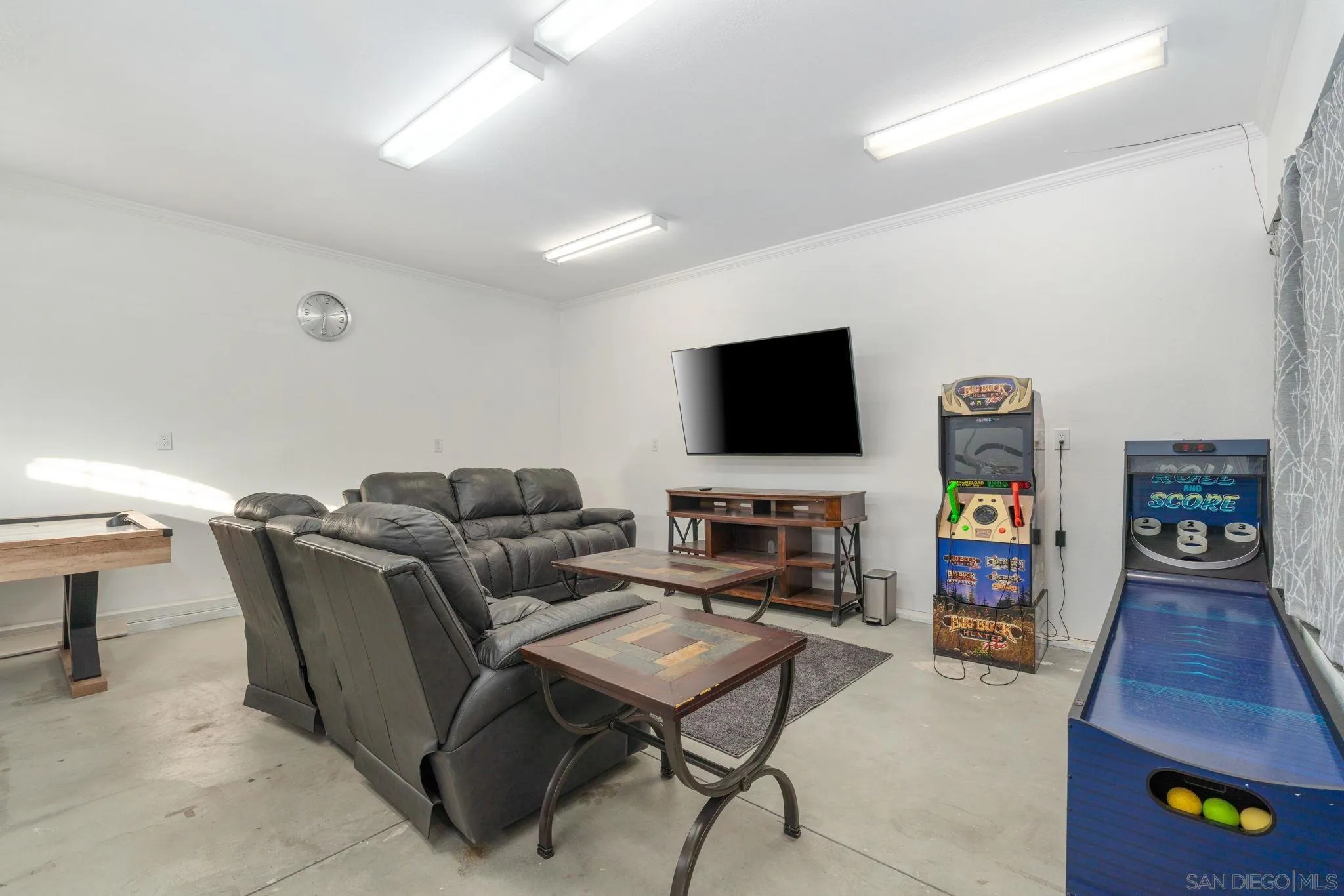 1842 Baldwin Lake Road Big Bear City, CA 92314 - Photo 38 of 40 a living room with furniture and a flat screen tv