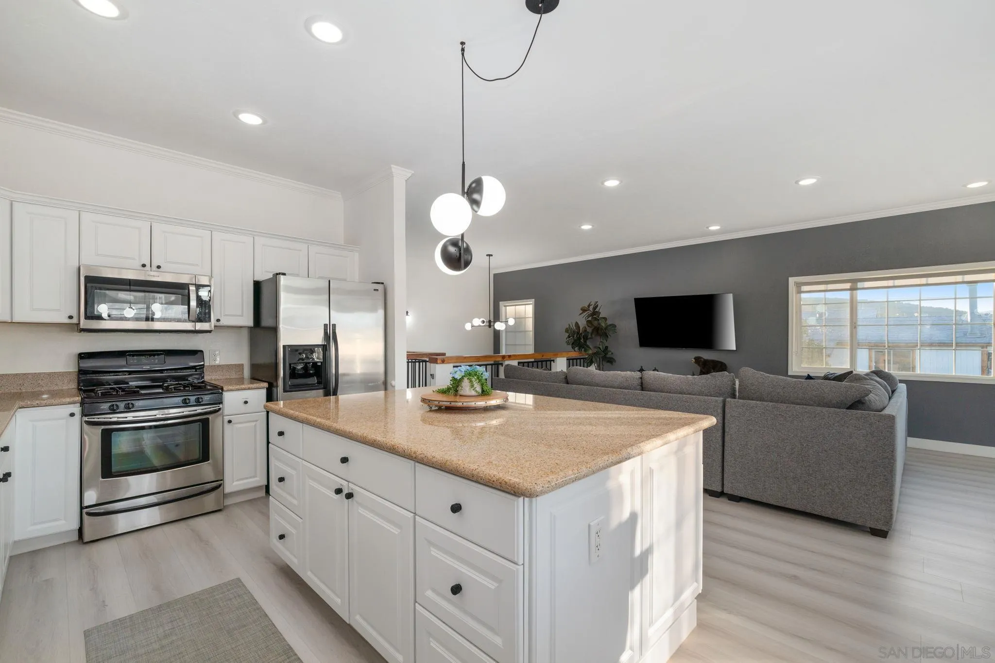 1842 Baldwin Lake Road Big Bear City, CA 92314 - Photo 4 of 40 a kitchen with stainless steel appliances granite countertop a stove and a sink
