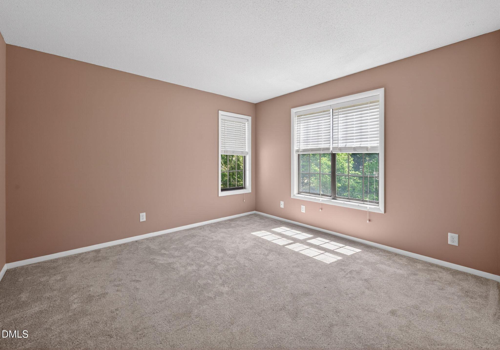 3704 Chimney Ridge Place, Unit 207 Durham, NC 27713 - Photo 12 of 31 an empty room with windows