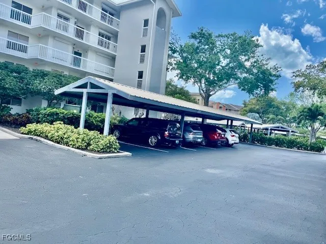a front view of a building with garden