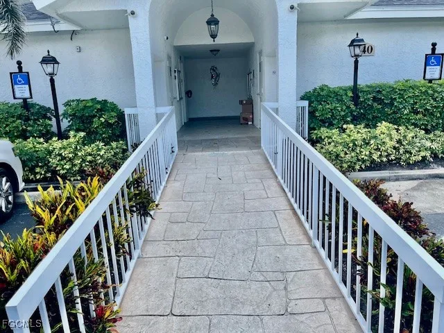 a view of a house with wooden stairs