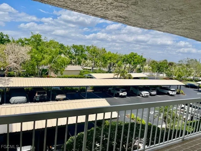 a bathroom with a granite countertop sink a mirror and vanity