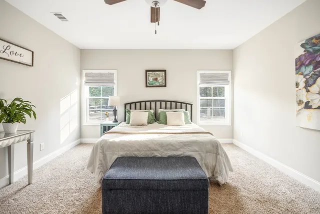 a bathroom with a shower and a sink