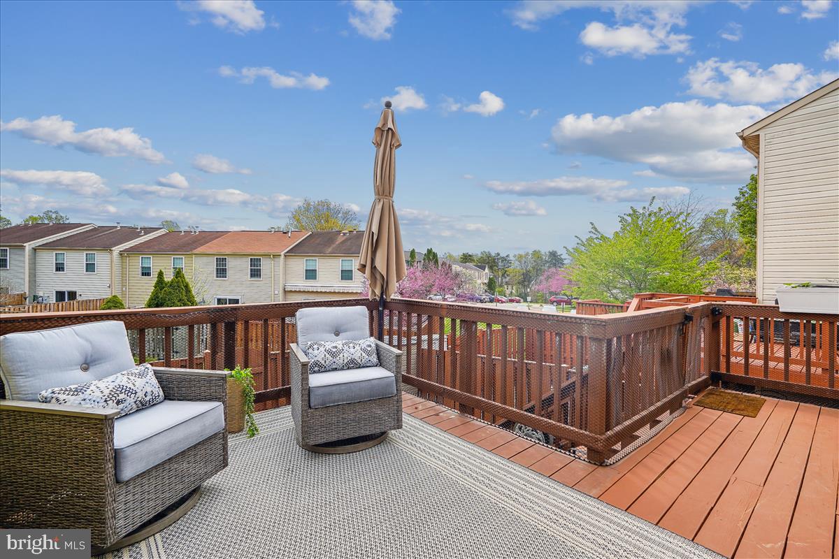 13964 Winding Ridge Lane Centreville, VA 20121 - Photo 14 of 48 Extend your relaxation onto the main level deck.